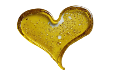 Golden heart shape filled with liquid on a dark background