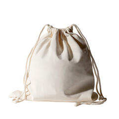 Beige cloth drawstring bag sits shadowed, plain against dark backdrop