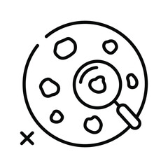 Magnifying glass over petri dish with samples