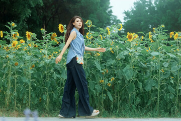 The girl in the sunflower garden