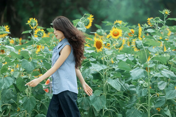 The girl in the sunflower garden
