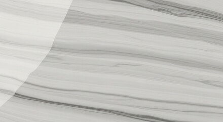 Obraz premium Elegant white and gray marble texture with soft veining, offering a sophisticated backdrop for luxury design projects and modern interior aesthetics.