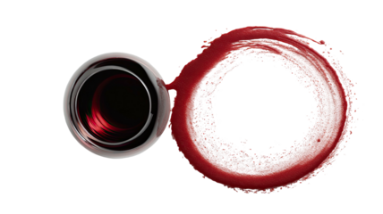 Red wine spills out of a glass, leaving a ring