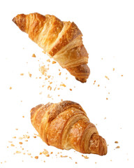 Two delicious golden croissant pastry floating with flaky crumbs. fresh baked food for breakfast from bakery, simply satisfying and sweet