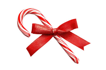 Candy cane with red bow isolated on black
