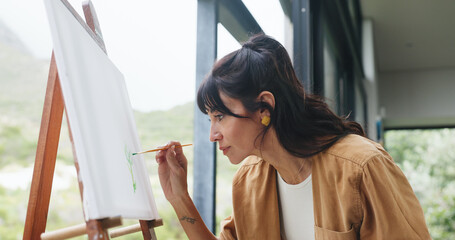 Woman, painting and brush with canvas for art, creativity or imagination for development in home....