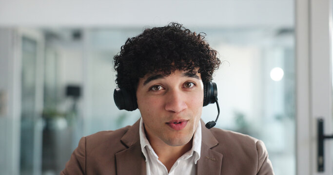 Video call, webinar and portrait of business man in office for virtual consultant, headset and broker seminar pov. Online meeting, digital conference and financial advisor with person for bokeh - Powered by Adobe