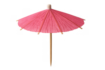 Pink drink umbrella celebrating summer tropical party cocktails with vibrant decorative paper and wooden toothpick