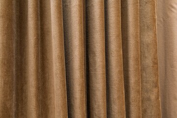Elevate your space with elegant taupe velvet curtains. Their rich texture and soft folds create a luxurious atmosphere, perfect for sophisticated home decor and stylish interiors.