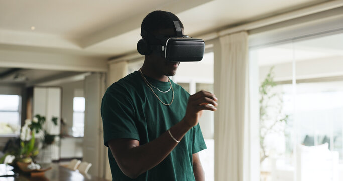 Gaming, metaverse and virtual reality with black man in home for interactive or online experience. Immersive, video game and vr headset with African person in apartment for futuristic entertainment