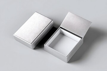 3D render of a blank silver packaging mockup placed on a smooth grey background in a minimalistic composition. 