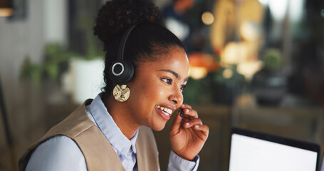 Contact us, woman and agent talk in call center for help desk, support or feedback at night. Customer service, happy person and consultant with mic for virtual assistance, advice and crm on overtime