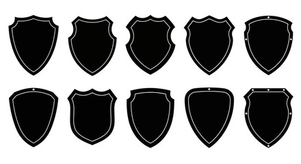 Collection of ten diverse black shield silhouettes with decorative borders on a white background