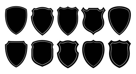 Collection of ten different black shield silhouettes isolated on white background