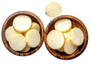 Sliced daikon in two wood bowls, overhead angle, clean cut