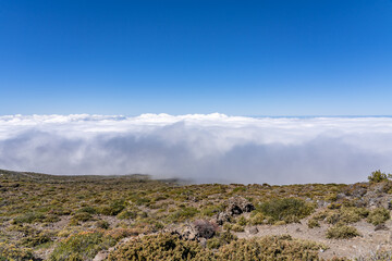 Temperature inversion. Leleiwi Overlook Trail, Haleakalā National Park, Maui, Hawaii. A sea of clouds is an overcast layer of stratocumulus clouds.

