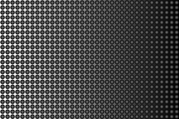 Geometric pattern of three-dimensional black circles with subtle shading, creating a metallic, embossed appearance, on a gradient background that transitions from light gray on the left to dark black 