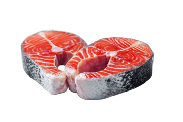 Two fresh salmon steaks with bright red flesh and grey skin fish food
