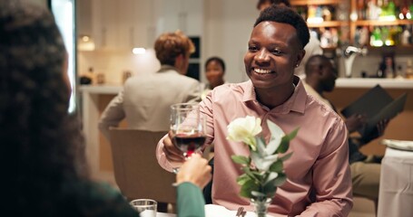 Couple, date and cheers in restaurant with wine for romance, anniversary celebration and love. Hospitality, conversation and happiness with man, woman and toast with alcohol beverage and bonding