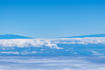 In the distance are Mauna Loa and Mauna Kea.  Red Hill / Haleakalā Summit, Maui, Hawaii. Haleakalā National Park