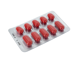 Ten red capsules in a blister pack