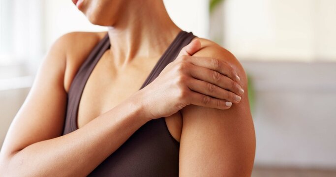 Hands, woman and discomfort of shoulder pain from pilates accident, inflammation and cramp. Female person, massage and joint injury from fitness, muscle sprain and exercise mistake with burnout risk