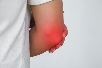 Elbow pain from tendon or joint inflammation—linked to bursitis, arthritis, or strain. Ideal for medical ads with copy space for your project.