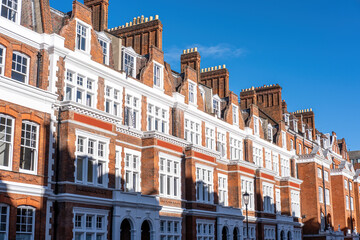 Fototapeta premium Traditional british detached houses with red bricks seen in Chelsea, London