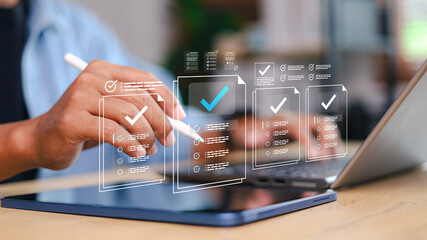 Businessman showing online document validation icon, quality assessment management With a...