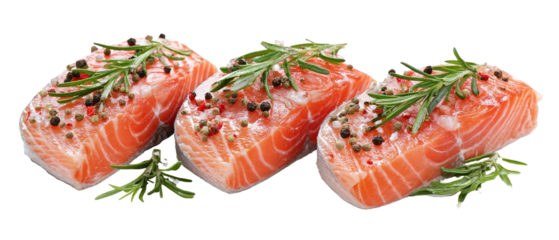 Fresh salmon fillets garnished with herbs and spices, arranged neatly on a white background, ideal for culinary presentations or cooking tutorials