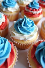Close up of patriotic cupcakes with red white and blue frosting