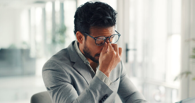 Frustrated, businessman and headache with stress for eye strain, deadline or project fail in office. Tired man, employee or analyst with pain or migraine for pressure or overworked in workplace