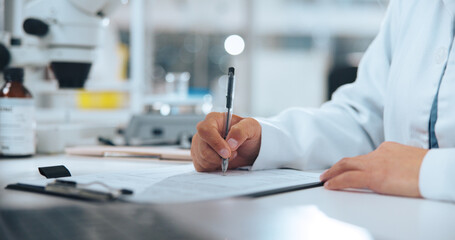 Hands, science and writing with person in laboratory for medical development or research results. Clipboard, notes and paperwork with scientist at work on clinic trial, experiment or investigation
