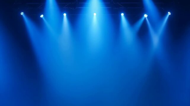 Stage Lighting With Blue Haze And Bright Beams On A Dark Empty Venue Floor Ready For Performance