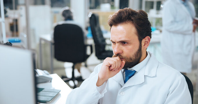 Thinking, man and scientist in laboratory with computer for research with medical study or discovery. Tech, problem solving and biologist with science project for healthcare innovation with analysis.