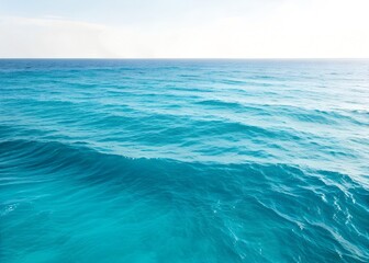 Fototapeta premium Blue ocean water surface with gentle waves and ripples. Isolated on white background.