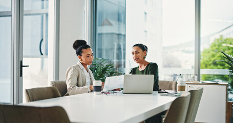 Laptop, discussion and business women in office for planning, finance report and collaboration. Computer, paperwork and financial advisors with investment proposal, tech and meeting in workplace