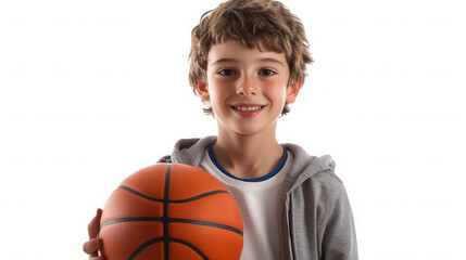 Young boy holding a basketball isolated on transparent background in studio
