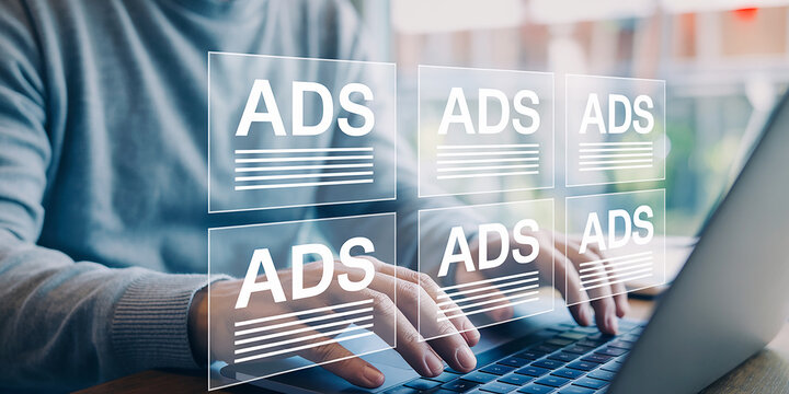 Person typing on laptop with digital advertising icons floating above keyboard marketing Modern Business Strategy and Corporate Success Concept – High Quality Professional Image