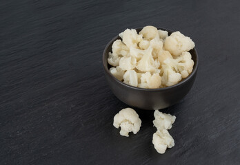 Steamed cauliflower pieces close up