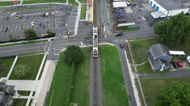 Aerial View of Train Traveling Down the Tracks
