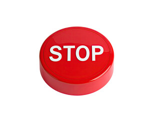 Red button with "STOP" text isolated on a black background