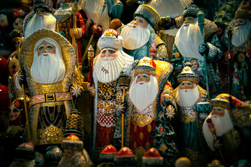 Hand-Painted Wooden Santa Figurines at a Hungarian Market