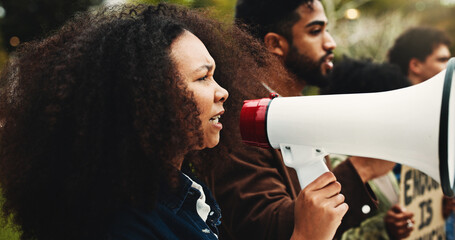 Climate change, protest and woman with megaphone, environment and awareness with ecology. Outdoor, people and crowd with bullhorn, group activism or screaming with global warming, unity or solidarity