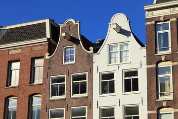 Rozengracht House Facades with Brown and White Clock Gables in Amsterdam, Netherlands
