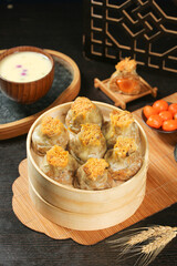 Chinese Pork and Egg Yolk Dim Sum Dumplings in Bamboo Steamer Traditional Asian Food