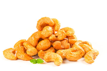 Grilled Vietnamese Cashew Nuts with Salt-Baked Amber Coating and Mint Garnish
