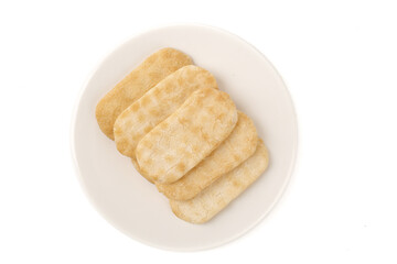 Japanese Senbei Rice Crackers on White Plate - Traditional Crispy Snacks