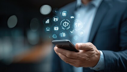Businessman in suit holds phone with illuminated app icons representing network, data, and global info
