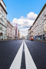 View of Tverskaya Street in Moscow showcasing open road and city architecture during daylight